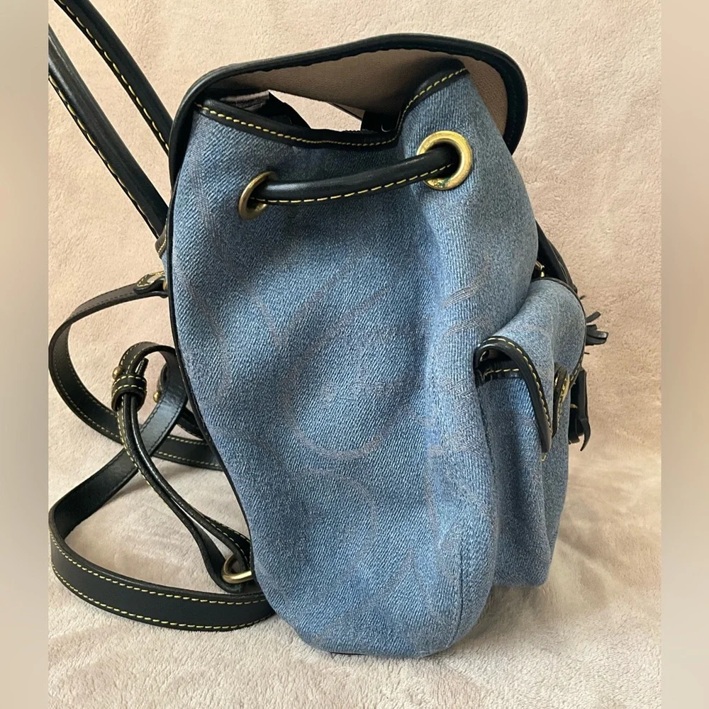 Dooney & Bourke Vintage Canyon Backpack in blue denim. 10.5”x 9.25”x 4”